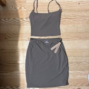 Top is  worn a few times bottom is brand new with the tags